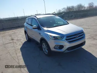 2017 Ford Escape SE with VIN 1FMCU0GDXHUB27848, listed as a IAAI auction lot 42047589 with 128,823 mi miles. Bid and sale history available at carsss.com. Image 1.