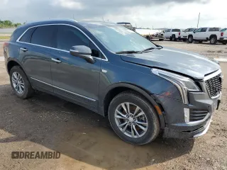 2021 Cadillac XT5 FWD Premium Luxury with VIN 1GYKNCRSXMZ118083, listed as a Copart auction lot 54703225 with 45,973 mi miles and Salvage Title. Bid and sale history available at carsss.com. Image 4.