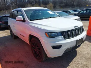 2017 Jeep Grand Cherokee Laredo with VIN 1C4RJFAG9HC824883, listed as a IAAI auction lot 41876117 with 141,067 mi miles. Bid and sale history available at carsss.com. Image 1.