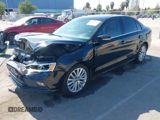 2015 Volkswagen Jetta Sedan 1.8T SE w/Connectivity with VIN 3VWD07AJ6FM354397, listed as a IAAI auction lot 41772983 with 100,265 mi miles. Bid and sale history available at carsss.com. Image 17.