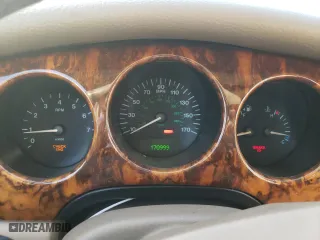 1999 Jaguar XJ with VIN SAJHD1048XC867723, listed as a Copart auction lot 76745444 with 170,999 mi miles and Salvage Title. Bid and sale history available at carsss.com. Image 9.