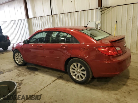 2010 Chrysler Sebring Limited with VIN 1C3CC5FB5AN146719, listed as a Copart auction lot 82712994 with 52,774 mi miles and Salvage Title. Bid and sale history available at carsss.com. Image 2.
