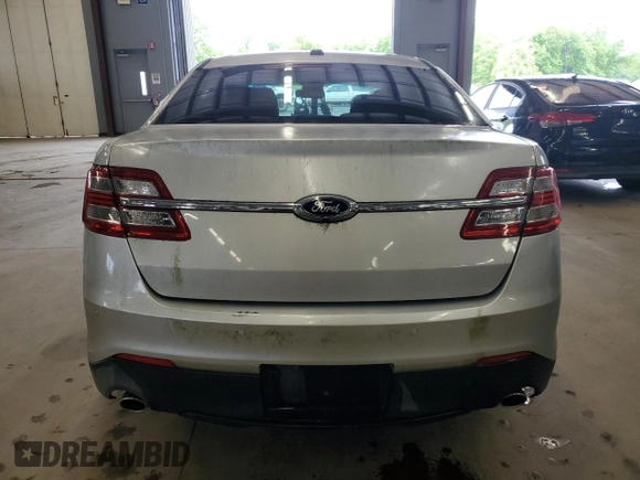 2014 Ford Taurus SEL z VIN 1FAHP2E86EG128370, wystawiony jako Copart lot #58216645 z przebiegiem 95 488 mil mil oraz Czysty tytuł • Clean title. Historia ofert i sprzedaży dostępna na DreamBid. Obrazek 6.