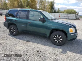2005 GMC Envoy SLT with VIN 1GKDT13S952144349, listed as a Copart auction lot 71800694 with 137,614 mi miles and Salvage Title. Bid and sale history available at DreamBid. Image 4.