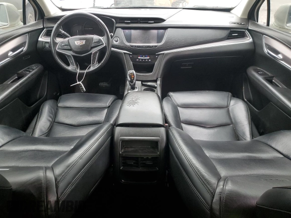 2017 Cadillac XT5 Luxury FWD with VIN 1GYKNBRS5HZ123174, listed as a Copart auction lot 43193045 with 96,617 mi miles and Salvage Title. Bid and sale history available at DreamBid. Image 8.
