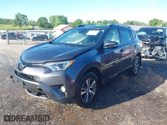2018 Toyota RAV4 XLE z VIN JTMWFREV1JJ197662, wystawiony jako IAAI lot #42167382 z przebiegiem 64 826 mil mil oraz . Historia ofert i sprzedaży dostępna na DreamBid. Obrazek 17.