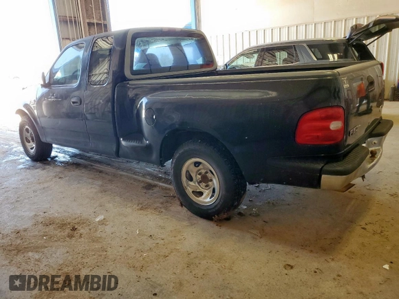 1998 Ford F-150 XL with VIN 1FTZX0725WKB83760, listed as a Copart auction lot 60988225 with 243,361 mi miles and Salvage title. Bid and sale history available at DreamBid. Image 2.