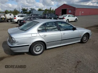 2000 BMW 5 Series 528iA with VIN WBADM6346YGU10549, listed as a Copart auction lot 75047164 with 324,945 mi miles and Salvage Title. Bid and sale history available at carsss.com. Image 3.