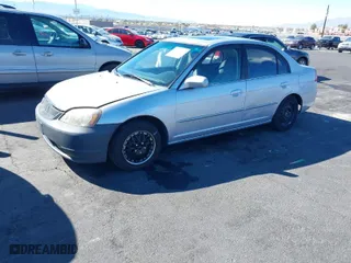 2002 Honda Civic EX with VIN 1HGES26842L006993, listed as a IAAI auction lot 41891213 with 219,196 mi miles. Bid and sale history available at carsss.com. Image 6.