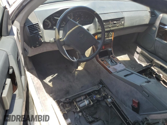 1994 Mercedes-Benz SL z VIN WDBFA63EXRF097007, wystawiony jako Copart lot #59714045 z przebiegiem Nie podano mil oraz Szkoda całkowita • Salvage title. Historia ofert i sprzedaży dostępna na DreamBid. Obrazek 8.