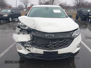 2021 Chevrolet Equinox Premier z VIN 2GNAXNEV7M6112087, wystawiony jako IAAI lot #41102702 z przebiegiem 32 995 mil mil oraz . Historia ofert i sprzedaży dostępna na DreamBid. Obrazek 12.