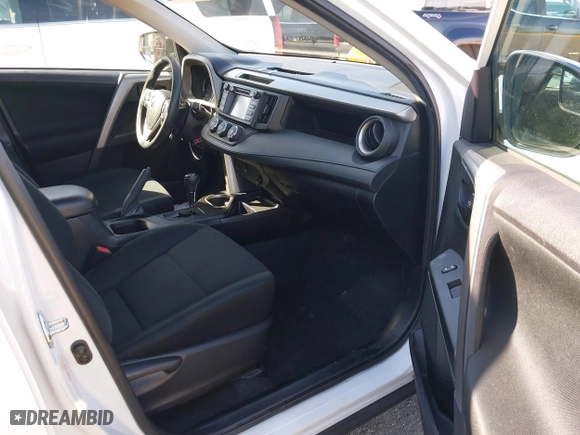 2018 Toyota RAV4 LE with VIN 2T3ZFREV8JW467744, listed as a IAAI auction lot 41818614 with 95,609 mi miles. Bid and sale history available at carsss.com. Image 5.