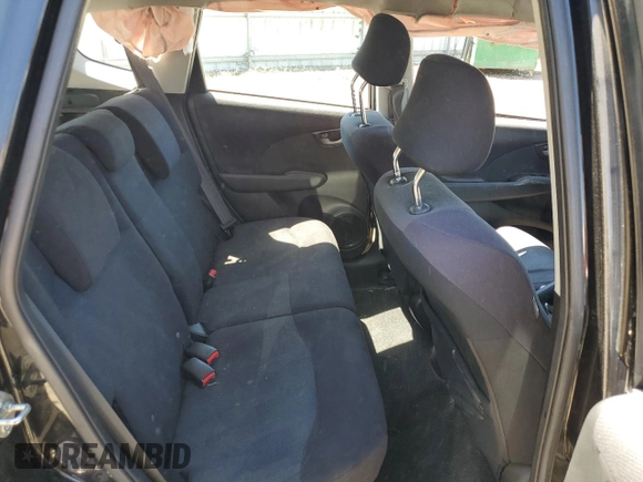 2011 Honda Fit Sport with VIN JHMGE8H57BC024827, listed as a Copart auction lot 59704194 with 146,316 mi miles and Salvage Title. Bid and sale history available at DreamBid. Image 11.
