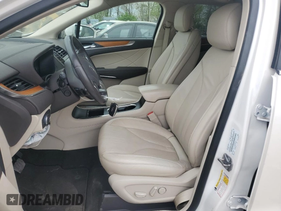 2019 Lincoln MKC Select z VIN 5LMCJ2D99KUL39648, wystawiony jako Copart lot #53755895 z przebiegiem 57 623 mil mil oraz Szkoda całkowita • Salvage title. Historia ofert i sprzedaży dostępna na DreamBid. Obrazek 7.