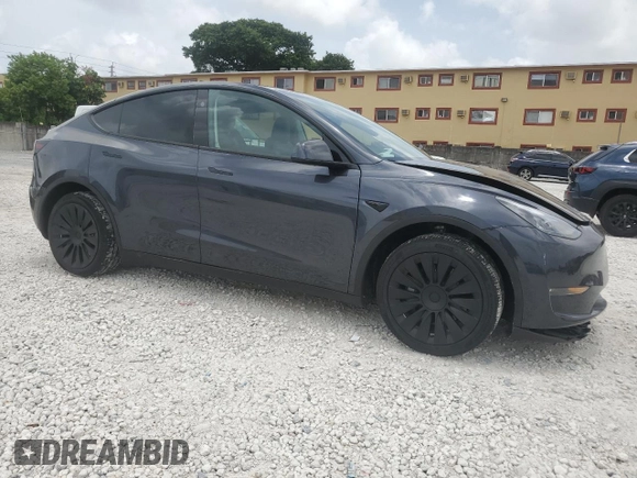 2024 Tesla Model Y Long Range с VIN 7SAYGDEE7RA279293, выставлен на аукционе Copart как лот 62758065 с пробегом 23 271 миль миль и Списание • Salvage title. История ставок и продаж доступна на DreamBid. Изображение 4.
