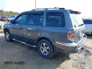 2007 Honda Pilot EX-L with VIN 5FNYF28737B001928, listed as a IAAI auction lot 41311134 with 243,870 mi miles. Bid and sale history available at carsss.com. Image 3.
