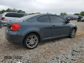 2007 Scion tC Spec z VIN JTKDE167570179636, wystawiony jako Copart lot #51235535 z przebiegiem 184 645 mil mil oraz Szkoda całkowita • Salvage title. Historia ofert i sprzedaży dostępna na DreamBid. Obrazek 3.