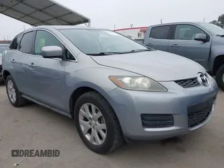 2008 Mazda CX-7 Grand Touring z VIN JM3ER29L580182222, wystawiony jako IAAI lot #42458585 z przebiegiem 127 640 mil mil oraz . Historia ofert i sprzedaży dostępna na DreamBid. Obrazek 1.