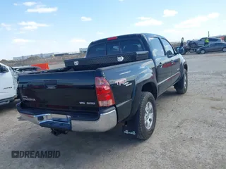 2006 Toyota Tacoma with VIN 3TMLU42N26M003196, listed as a IAAI auction lot 41841142 with 158,691 mi miles and . Bid and sale history available at DreamBid. Image 4.