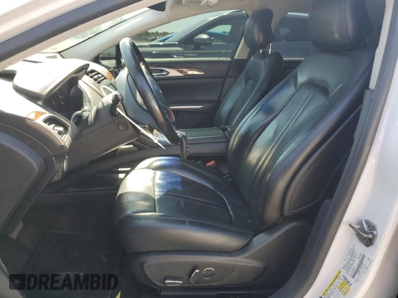 2015 Lincoln MKZ z VIN 3LN6L2JK8FR616661, wystawiony jako Copart lot #61588325 z przebiegiem 65 382 mil mil oraz Szkoda całkowita • Salvage title. Historia ofert i sprzedaży dostępna na DreamBid. Obrazek 7.