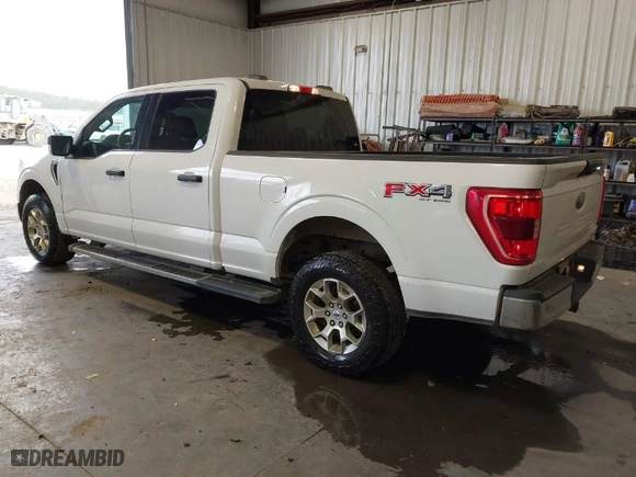 2021 Ford F-150 XL with VIN 1FTFW1E82MFB31401, listed as a IAAI auction lot 41974324 with 112,933 mi miles. Bid and sale history available at carsss.com. Image 3.