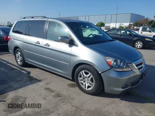 2007 Honda Odyssey EX-L with VIN 5FNRL38727B028976, listed as a IAAI auction lot 42138341 with 169,936 mi miles. Bid and sale history available at carsss.com. Image 1.