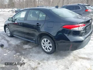 2023 Toyota Corolla Hybrid LE with VIN JTDBDMHE7P3004396, listed as a IAAI auction lot 41606222 with 15,037 mi miles. Bid and sale history available at carsss.com. Image 3.