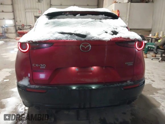 2022 Mazda CX-30 2.5 Turbo with VIN 3MVDMBAY5NM427943, listed as a IAAI auction lot 41585519 with 32,807 mi miles and . Bid and sale history available at DreamBid. Image 16.