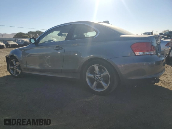 2010 BMW 1 Series 128i with VIN WBAUP9C54AVL89302, listed as a Copart auction lot 76716114 with 65,882 mi miles and Salvage Title. Bid and sale history available at DreamBid. Image 2.