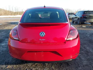 2019 Volkswagen Beetle S with VIN 3VWFD7AT1KM712384, listed as a IAAI auction lot 41505127 with 49,527 mi miles and . Bid and sale history available at DreamBid. Image 16.