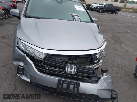 2022 Honda Odyssey EX-L with VIN 5FNRL6H77NB041754, listed as a IAAI auction lot 41791425 with 15,306 mi miles and . Bid and sale history available at DreamBid. Image 13.