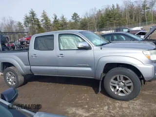 2015 Toyota Tacoma with VIN 3TMMU4FN7FM075543, listed as a IAAI auction lot 41761520 with 107,230 mi miles and . Bid and sale history available at DreamBid. Image 14.