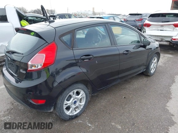 2015 Ford Fiesta SE z VIN 3FADP4EJ3FM115466, wystawiony jako IAAI lot #41849165 z przebiegiem 178 002 mil mil oraz . Historia ofert i sprzedaży dostępna na DreamBid. Obrazek 4.