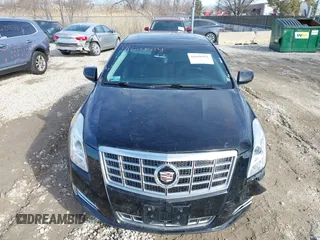 2015 Cadillac XTS Luxury z VIN 2G61N5S35F9155543, wystawiony jako IAAI lot #41699914 z przebiegiem 120 700 mil mil oraz . Historia ofert i sprzedaży dostępna na DreamBid. Obrazek 13.