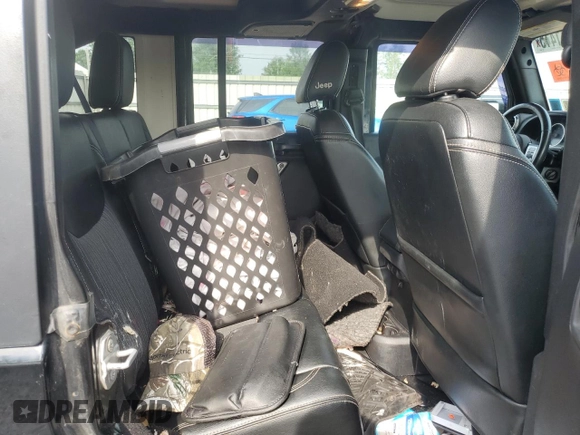 2015 Jeep Wrangler Unlimited Freedom with VIN 1C4BJWDG4FL568601, listed as a Copart auction lot 64041415 with 128,874 mi miles and Salvage title. Bid and sale history available at DreamBid. Image 11.