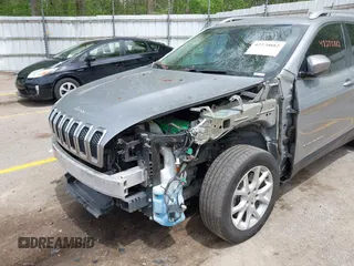 2016 Jeep Cherokee Latitude z VIN 1C4PJMCS9GW213469, wystawiony jako IAAI lot #42270882 z przebiegiem 144 499 mil mil oraz . Historia ofert i sprzedaży dostępna na DreamBid. Obrazek 6.