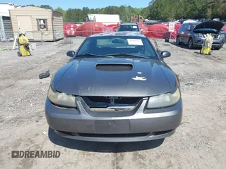 2003 Ford Mustang Standard z VIN 1FAFP40463F327753, wystawiony jako IAAI lot #42005257 z przebiegiem 325 449 mil mil oraz . Historia ofert i sprzedaży dostępna na DreamBid. Obrazek 13.