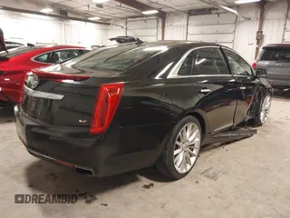 2014 Cadillac XTS Platinum with VIN 2G61W5S88E9186969, listed as a IAAI auction lot 41422872 with 184,998 mi miles and . Bid and sale history available at DreamBid. Image 4.