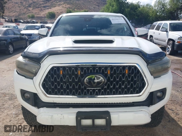 2018 Toyota Tacoma SR5 with VIN 3TMDZ5BN2JM037580, listed as a IAAI auction lot 42248418 with 35,661 mi miles and . Bid and sale history available at DreamBid. Image 11.