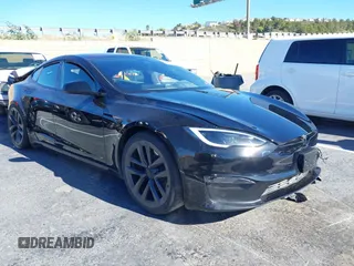 2022 Tesla Model S with VIN 5YJSA1E52NF476906, listed as a IAAI auction lot 41320074 with Not Provided miles and . Bid and sale history available at DreamBid. Image 1.