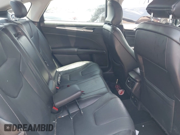 2016 Ford Fusion Titanium with VIN 3FA6P0K93GR113507, listed as a IAAI auction lot 42458659 with 133,708 mi miles and . Bid and sale history available at DreamBid. Image 8.