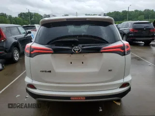 2018 Toyota RAV4 SE with VIN 2T3NFREV5JW416779, listed as a Copart auction lot 60283105 with 64,255 mi miles and Salvage title. Bid and sale history available at DreamBid. Image 6.