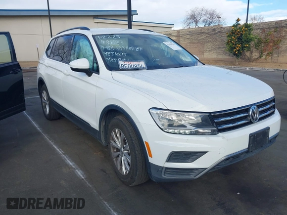 2019 Volkswagen Tiguan S with VIN 3VV1B7AX2KM039970, listed as a IAAI auction lot 41498706 with 56,907 mi miles and . Bid and sale history available at DreamBid. Image 1.