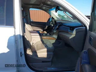 2016 Chevrolet Tahoe LTZ with VIN 1GNSKCKC0GR203348, listed as a IAAI auction lot 42220438 with 108,657 mi miles and . Bid and sale history available at DreamBid. Image 5.