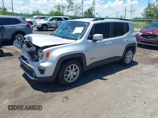 2020 Jeep Renegade Latitude with VIN ZACNJABB8LPL63973, listed as a IAAI auction lot 42552558 with 104,089 mi miles and . Bid and sale history available at DreamBid. Image 2.