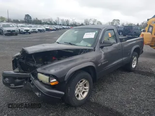 2002 Dodge Dakota with VIN 1B7FL16X62S683972, listed as a IAAI auction lot 41972271 with 158,436 mi miles and . Bid and sale history available at carsss.com. Image 17.