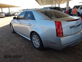 2013 Cadillac CTS Luxury with VIN 1G6DE5E52D0156666, listed as a IAAI auction lot 42058687 with 120,659 mi miles and . Bid and sale history available at DreamBid. Image 3.