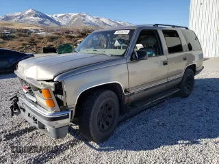 1998 GMC Yukon with VIN 1GKEK13R1WR508227, listed as a Copart auction lot 88325315 with 238,085 mi miles and Salvage Title. Bid and sale history available at carsss.com. Image 1.