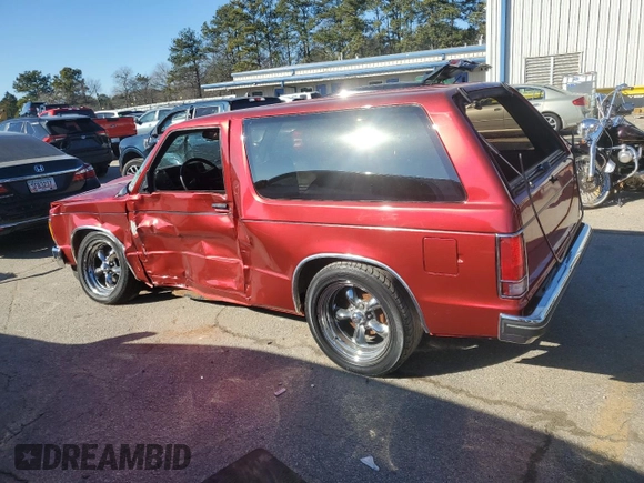 1990 Chevrolet Blazer z VIN 1GNCS18Z2L8113073, wystawiony jako Copart lot #87676865 z przebiegiem 22 827 mil mil oraz Szkoda całkowita • Salvage title. Historia ofert i sprzedaży dostępna na DreamBid. Obrazek 2.