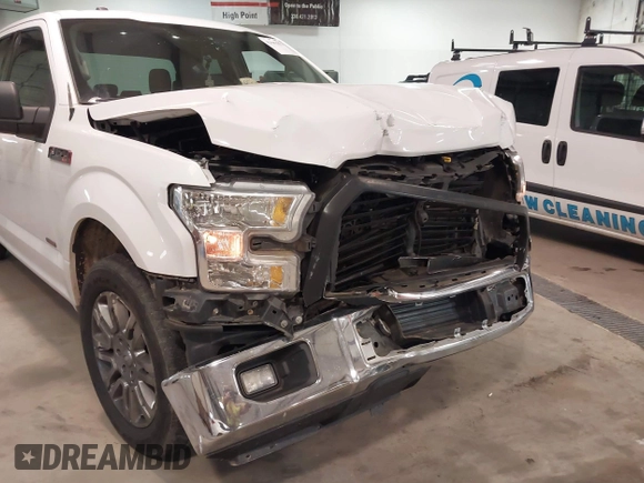 2015 Ford F-150 XL with VIN 1FTEX1CG5FKD31637, listed as a IAAI auction lot 41607827 with 201,278 mi miles. Bid and sale history available at carsss.com. Image 6.